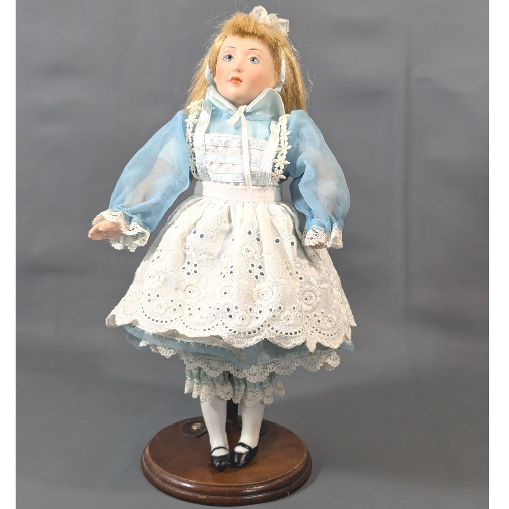 Alice in Wonderland Porcelain Doll 11.5 In. Bisque Blue Dress Eyelet Apron Stand